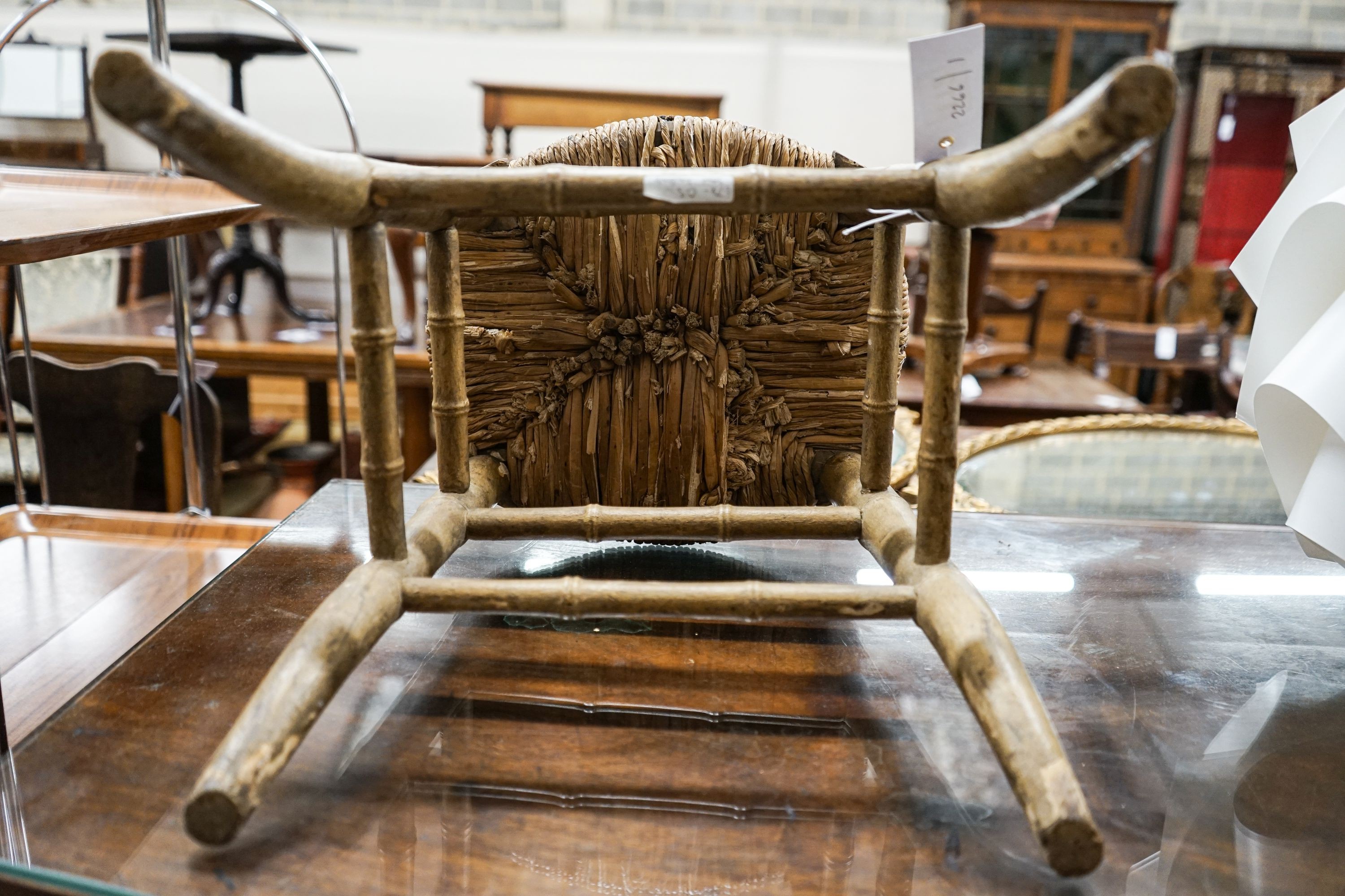 A Regency provincial rush seat simulated bamboo stool, width 34cm, depth 28cm, height 35cm